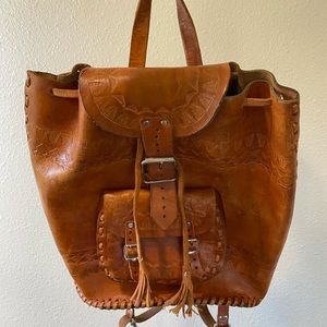 Vintage tooled leather backpack